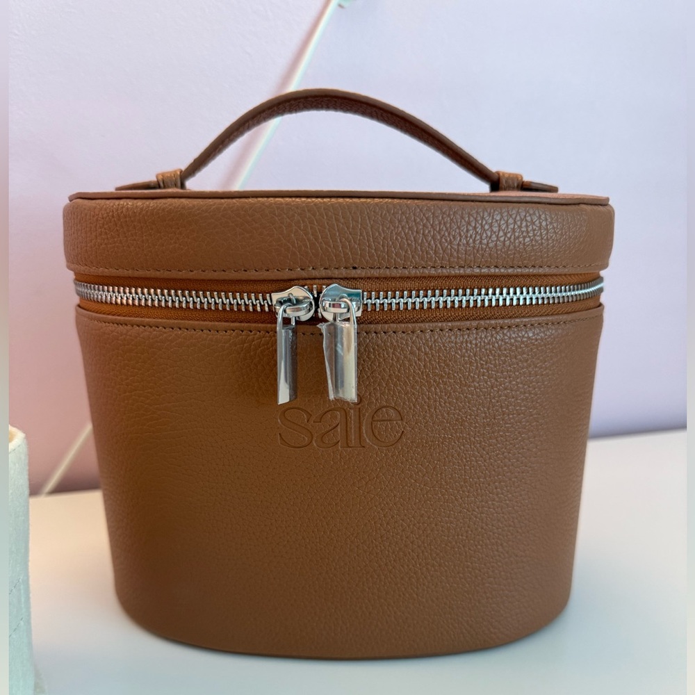 Saie Brown Cosmetic Bags with Textured Leather and Zipper Closures